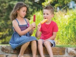 Kids enjoying a popsicle